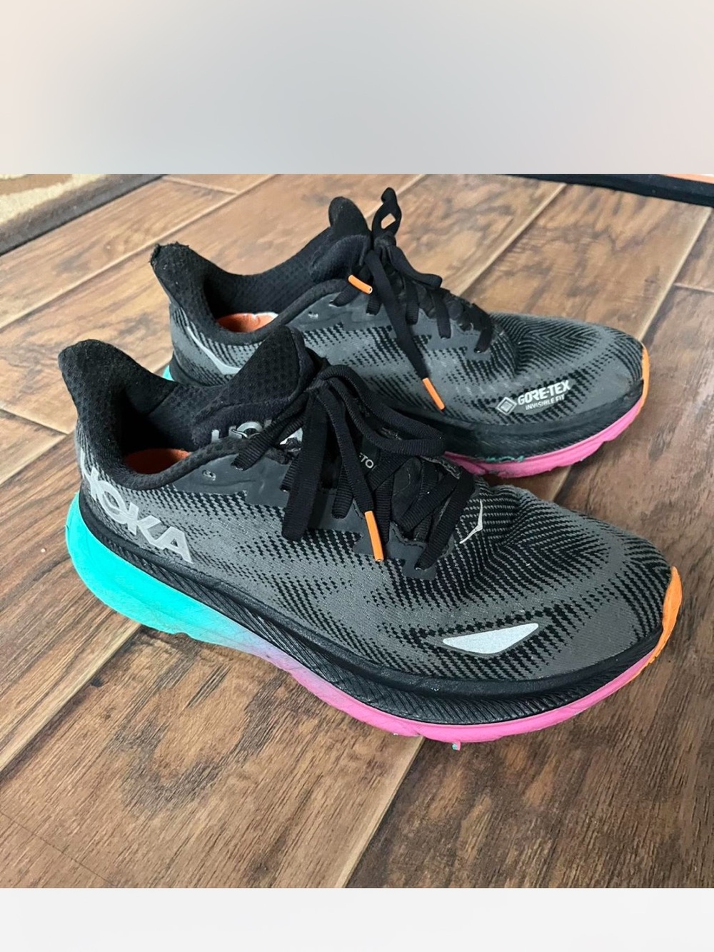 Hoka One One Women's Black Athletic Shoes with Pink and Teal Accents